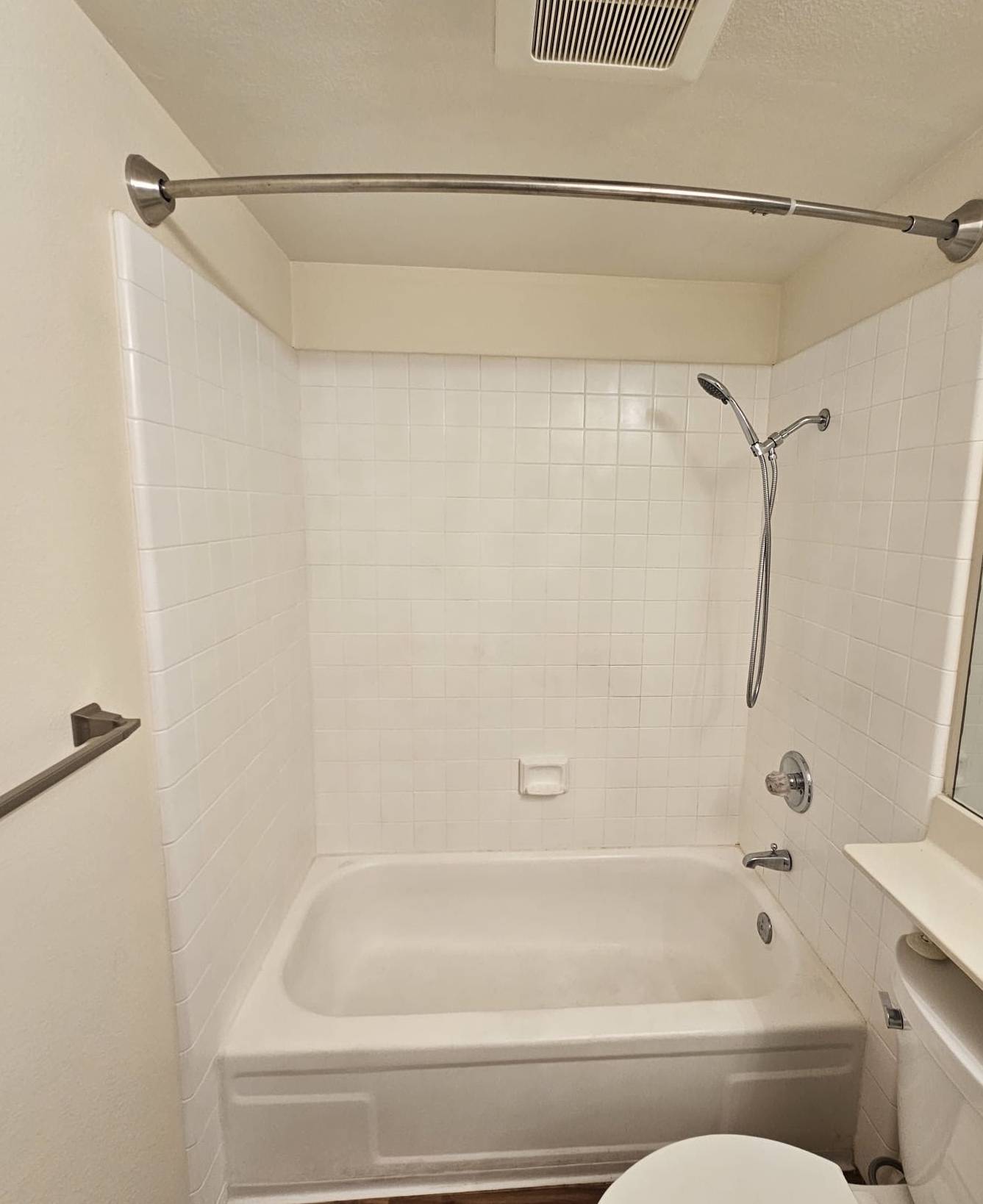 Before shower refinishing - stained and damaged shower