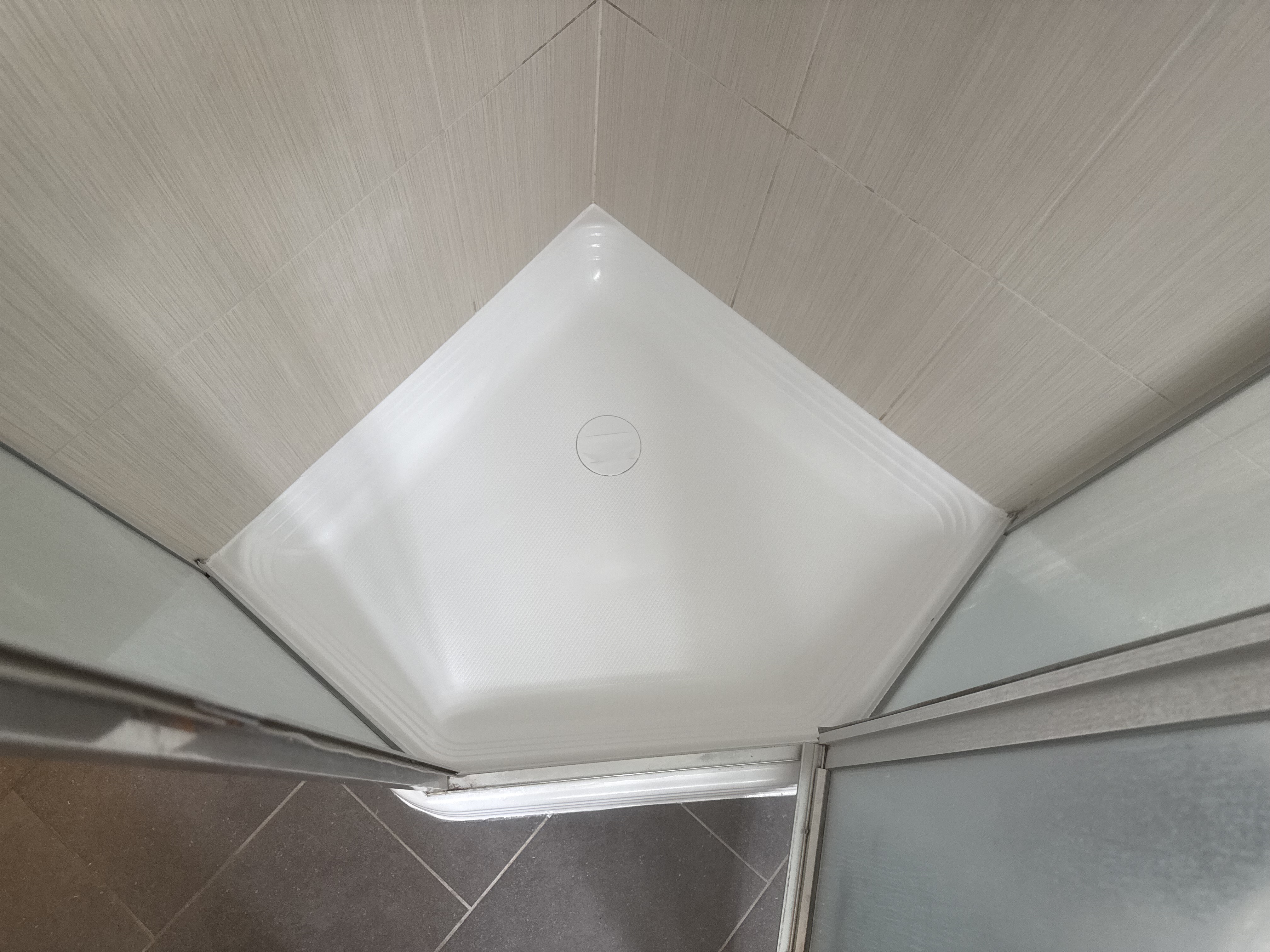 After shower pan refinishing - restored bright white shower base