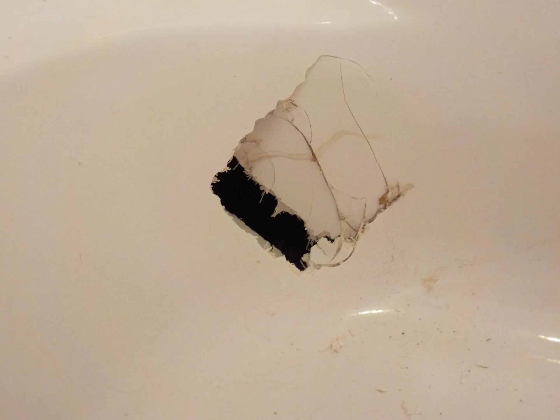 Bathtub hole before repair