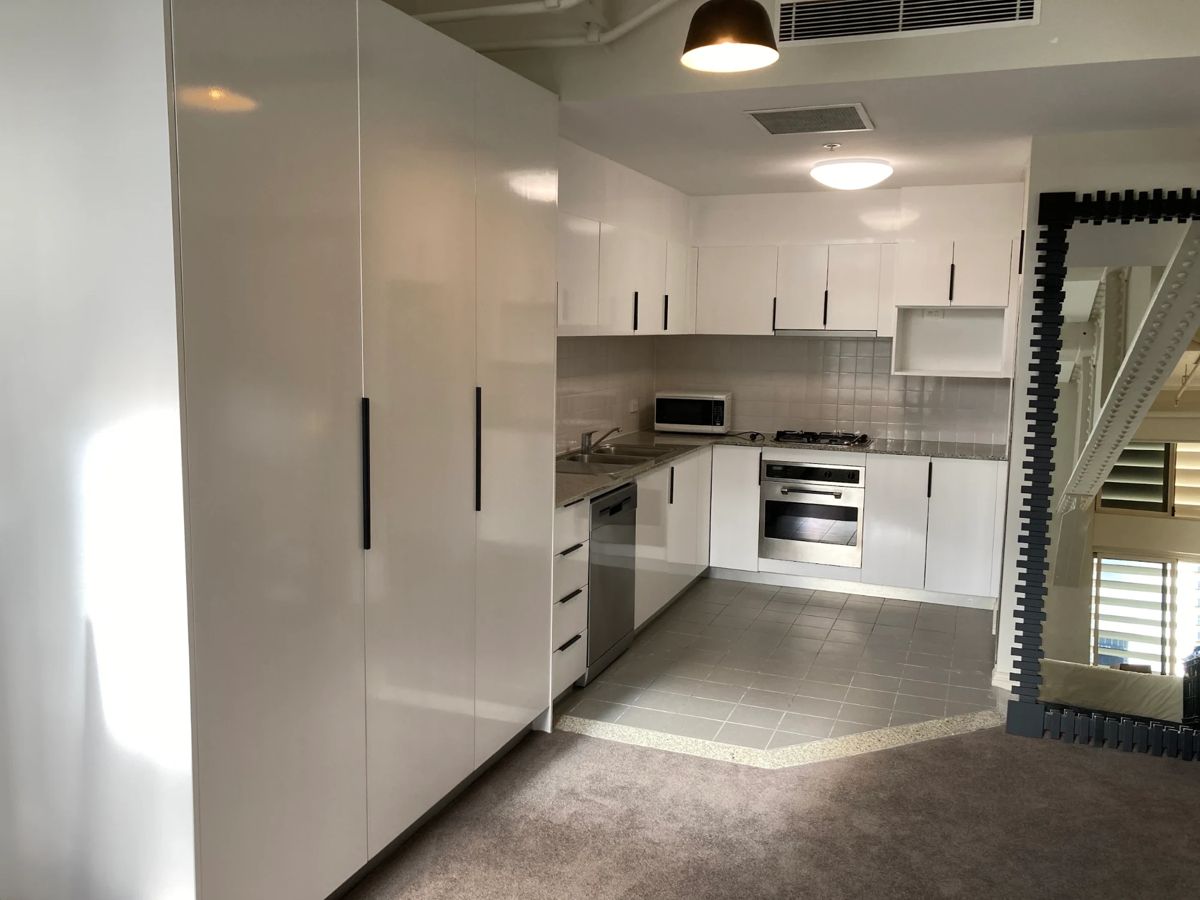 Wood-veneer kitchen cabinets after painting