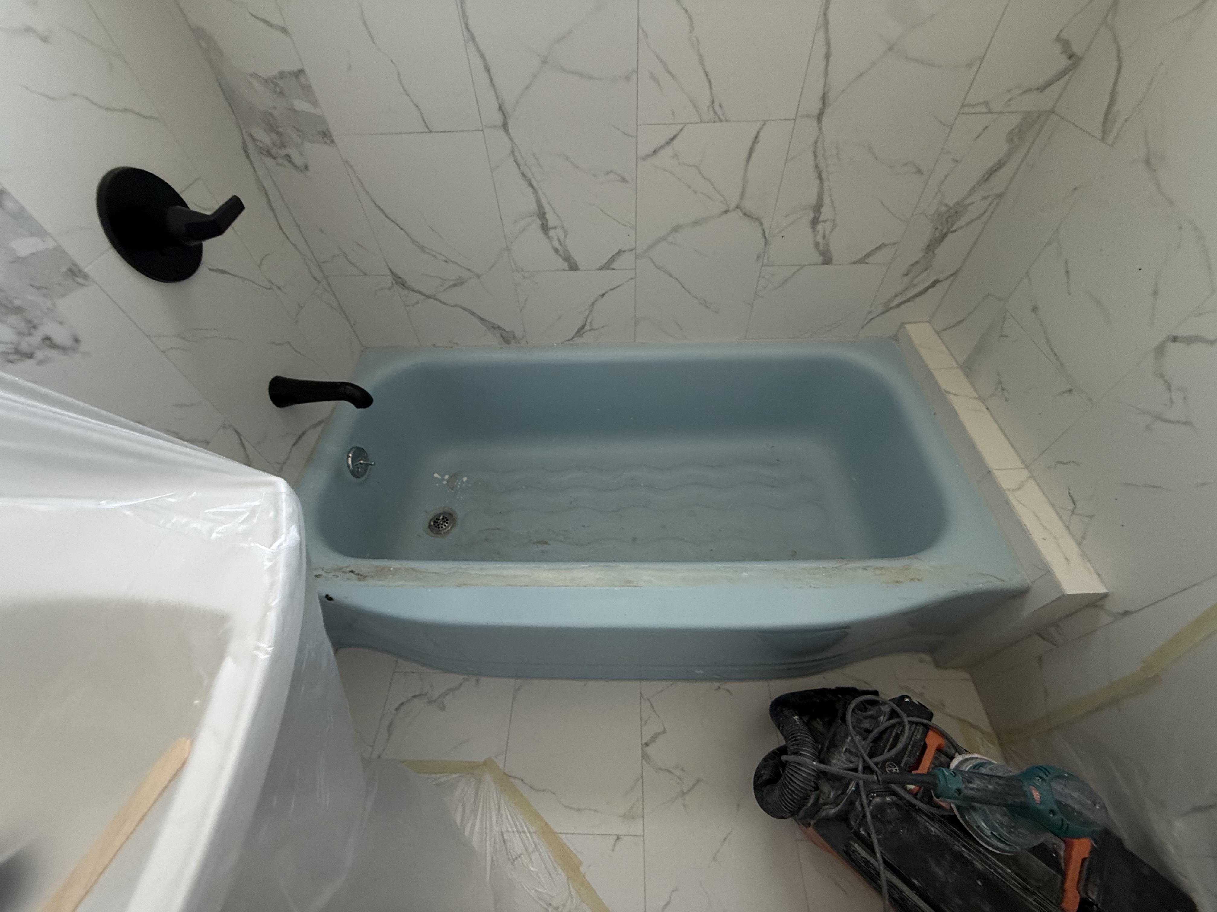 Before porcelain bathtub refinishing