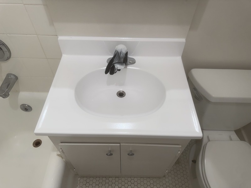 After sink refinishing - restored bright white sink